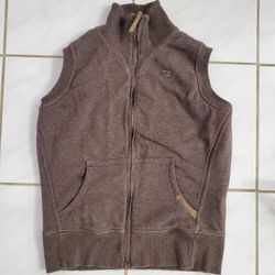 Nike Womens Large (12-14) Gray Full Zip Sherpa Lined Vest Jacket.

Condition: Pre-owned, in excellent condition! Only flaw is a little stain at the fr