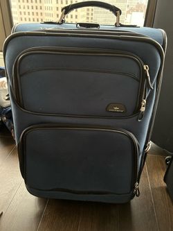 Rolling Blue Suitcase