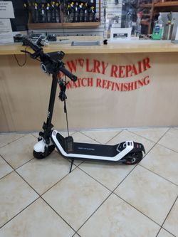 Niu kqi300p all terrain suspension electric scooter 20mph range 30 miles