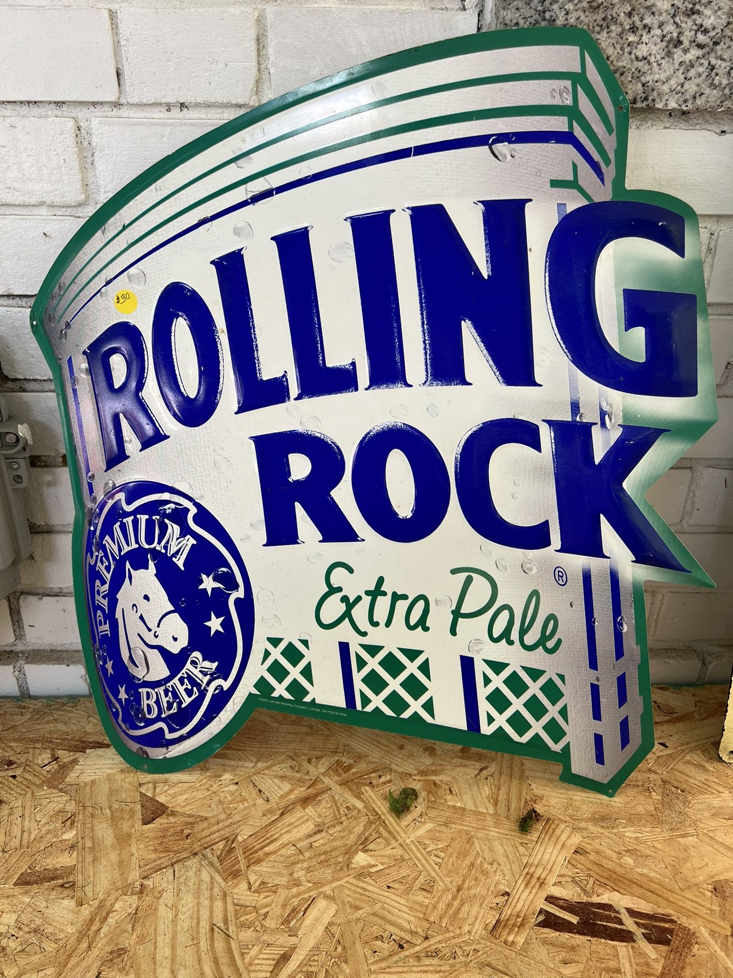 Rolling Rock beer metal signs and neon light
