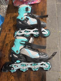 Roller blades/ roller skates  size 21-24