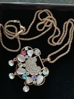 Gold tone crystal-accented sweater chain