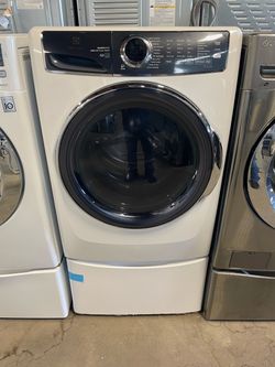 Lavadora Electrolux con pedestales