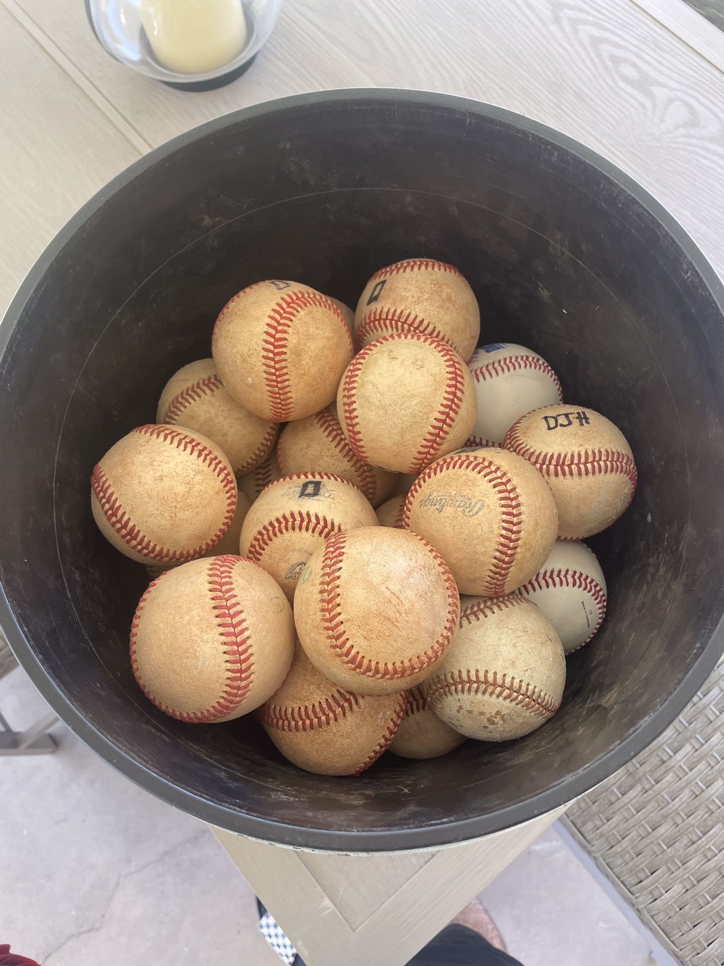 Buckets of Leather Baseballs and Wiffle balls
