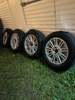 Rims and tires (4) New 215/60R17