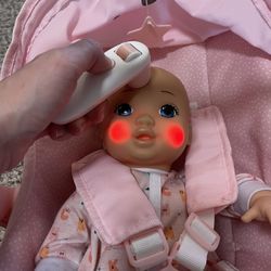 Baby doll with car seat.