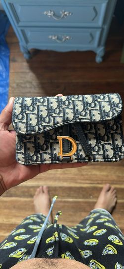 Christian Dior small woman’s purse $85