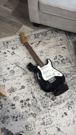 Kids guitar missing a string