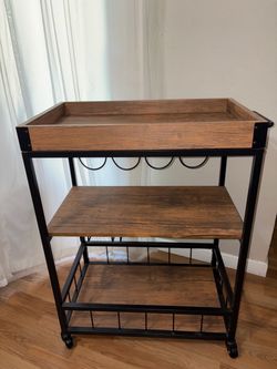 Bar cart with wheels, need gone !