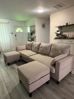 MOVING! Like new beige couch+ 2 ottoman