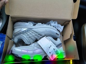 SALOMON.   METAL GREY SILVER METALLIC X