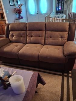Leather sofa with recliner on the sides and a recliner seat all included