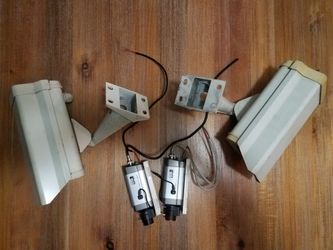 4 Hd night and day cameras with housing and mounting brackets