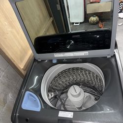 Samsung 4.4 cu. ft.  Top Load Washer And 7.4 Cu. Ft Front Load  Dryer 