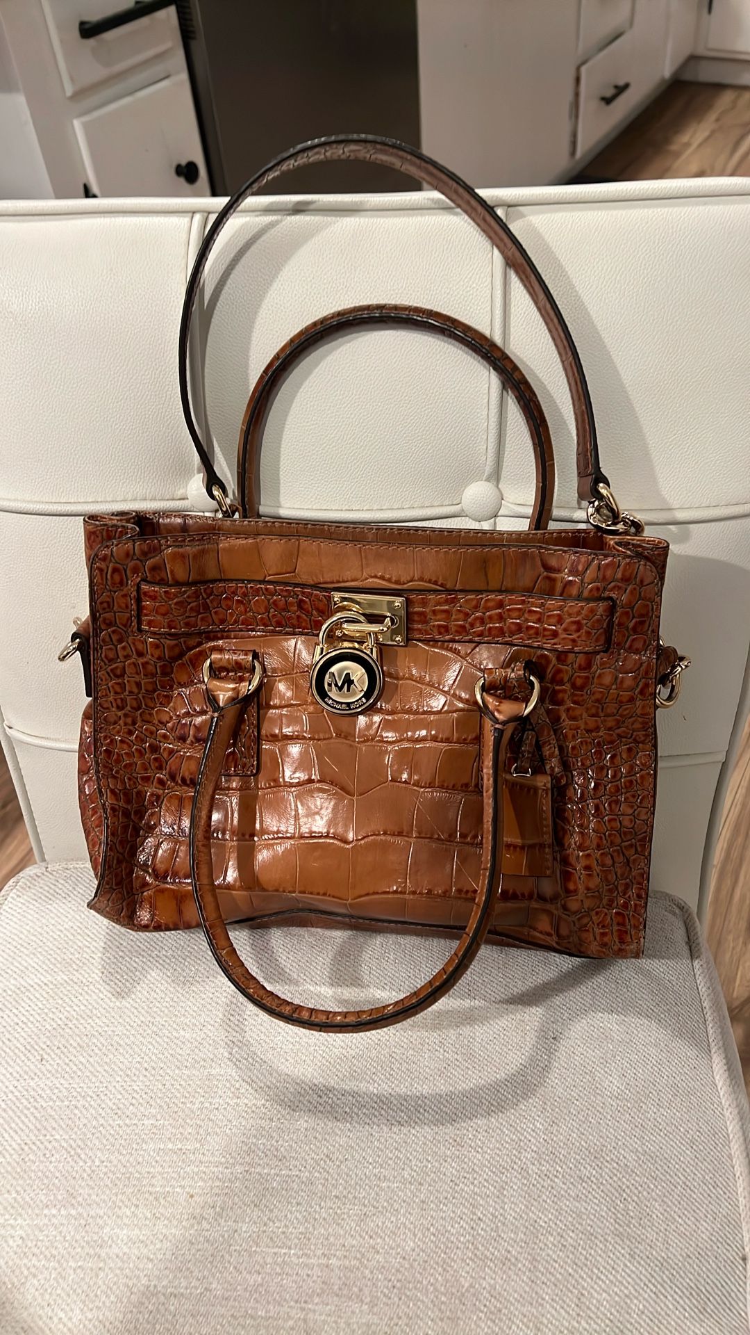 Michael Kors, alligator and boss bag