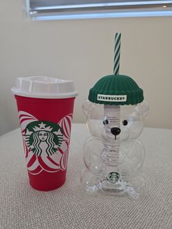 Starbucks glass bear cup and small red plastic tumbler