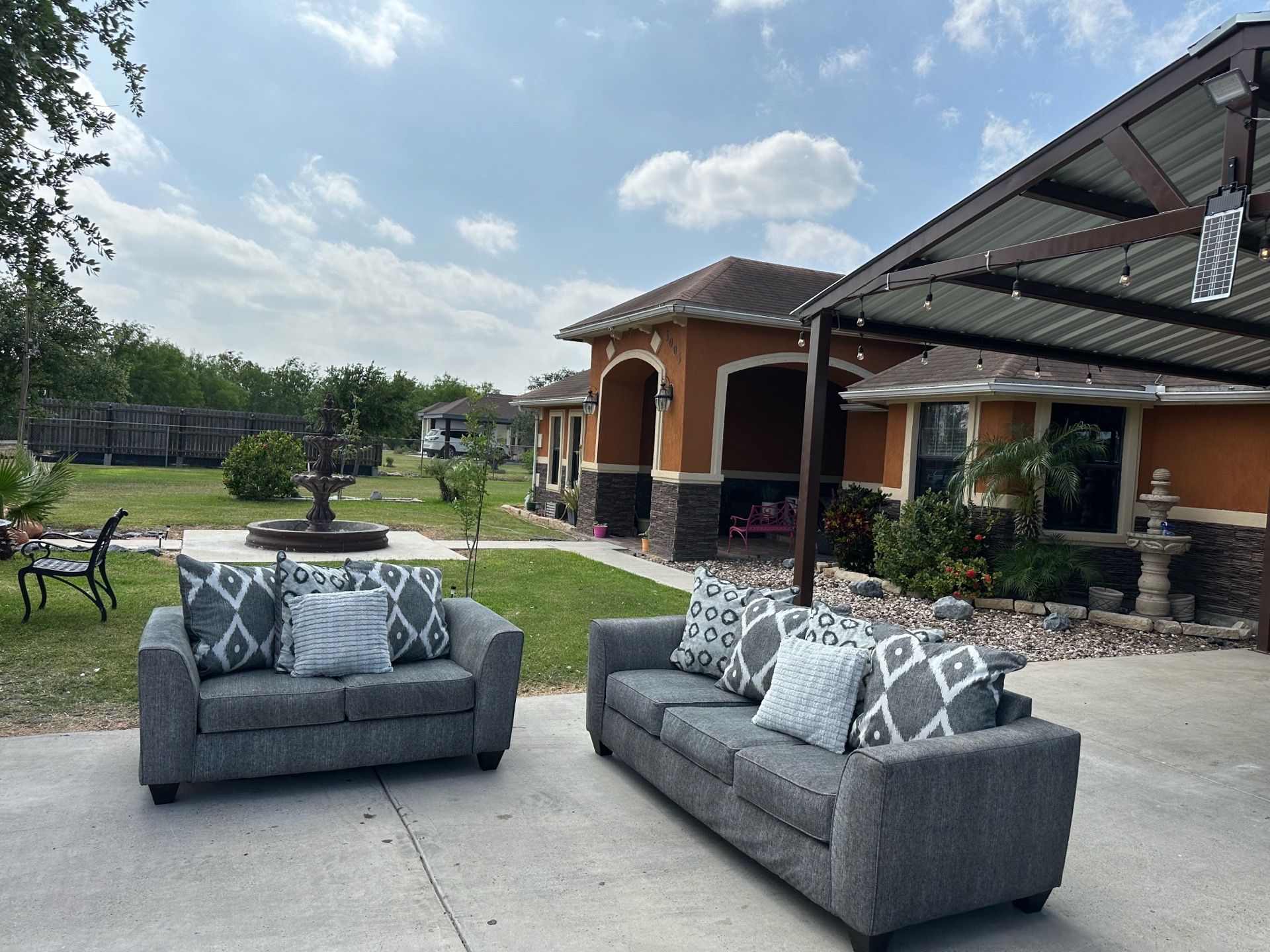 Beautiful grey two piece sofa set super comfy and nice asking 550