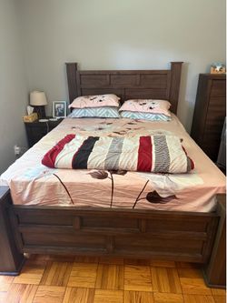 Queen bed frame with mattress and box spring
