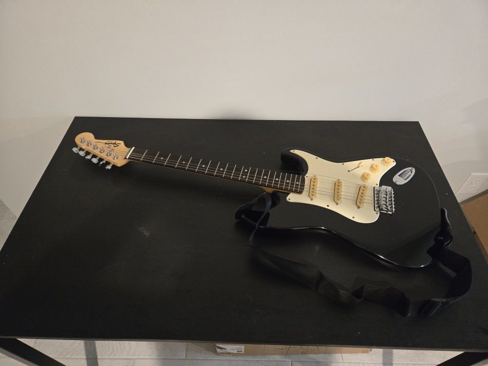 Black Electric Guitar With Case