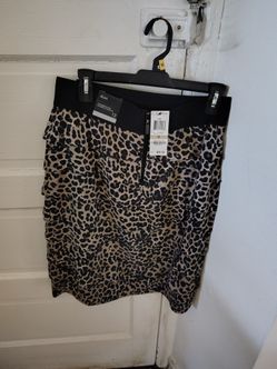 Alfani tiered leopard print skirt with an elastic waist.