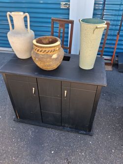 Black Wood Cabinet with Three Doors