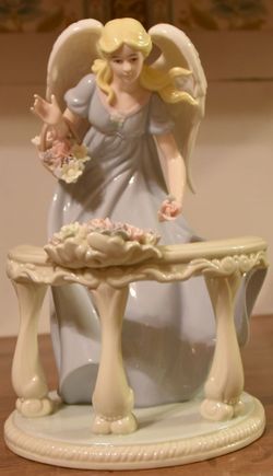 Angel Standing on Balcony