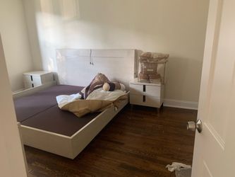 Full bed set. Light beige wood. One dresser with mirror and 2 nightstands