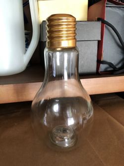 Lightbulb bottle with flashlights on the bottom
