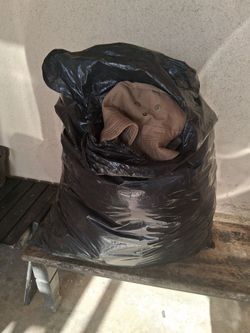 Trash bag of clothes you pick