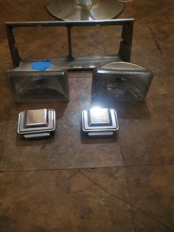 Oldsmobile Cutlass  headlight bezel and light bulbs :