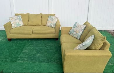 Beautiful lemon green two-piece sofa can be delivered for an additional cost Price 200