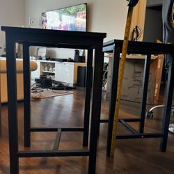 TWO black counter stools