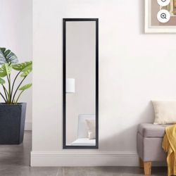 Small grey full-body mirror