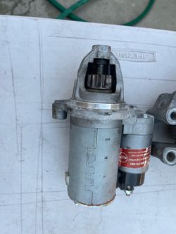 Compressor, alternator and a starter