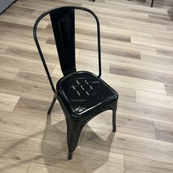 Set Of Four Metal Stacking Chairs 