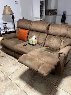 Lazy Boy Couch. Color is brown. 80" long; 30" wide; 28" height. No