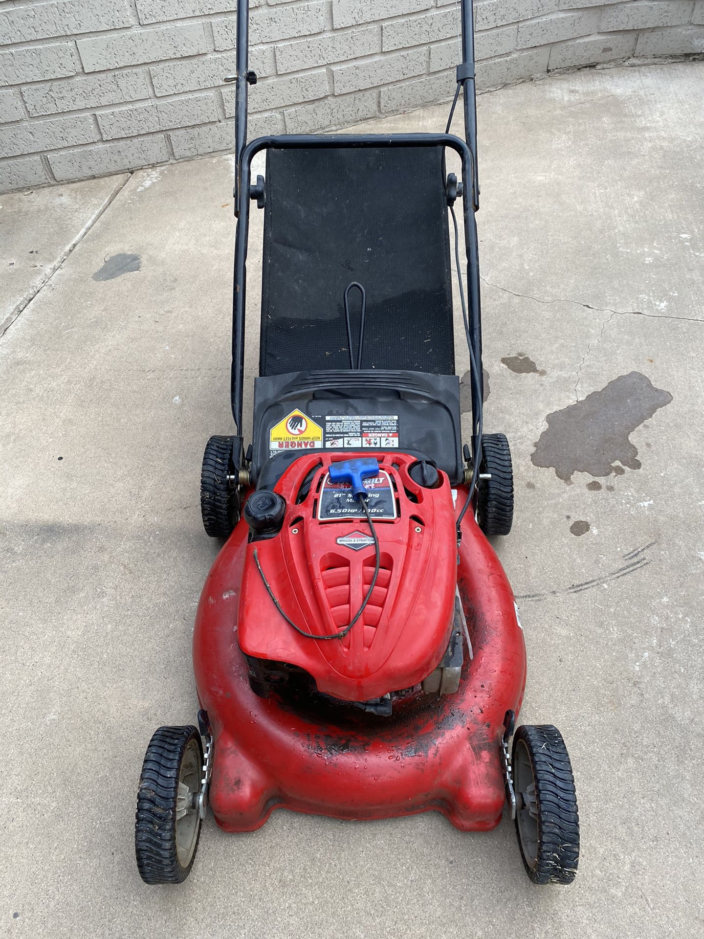 Troy Bilt 21” Mulching Mover {link removed} this machine need new pull string works !!