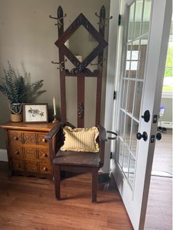 Vintage hall tree with umbrella holder.