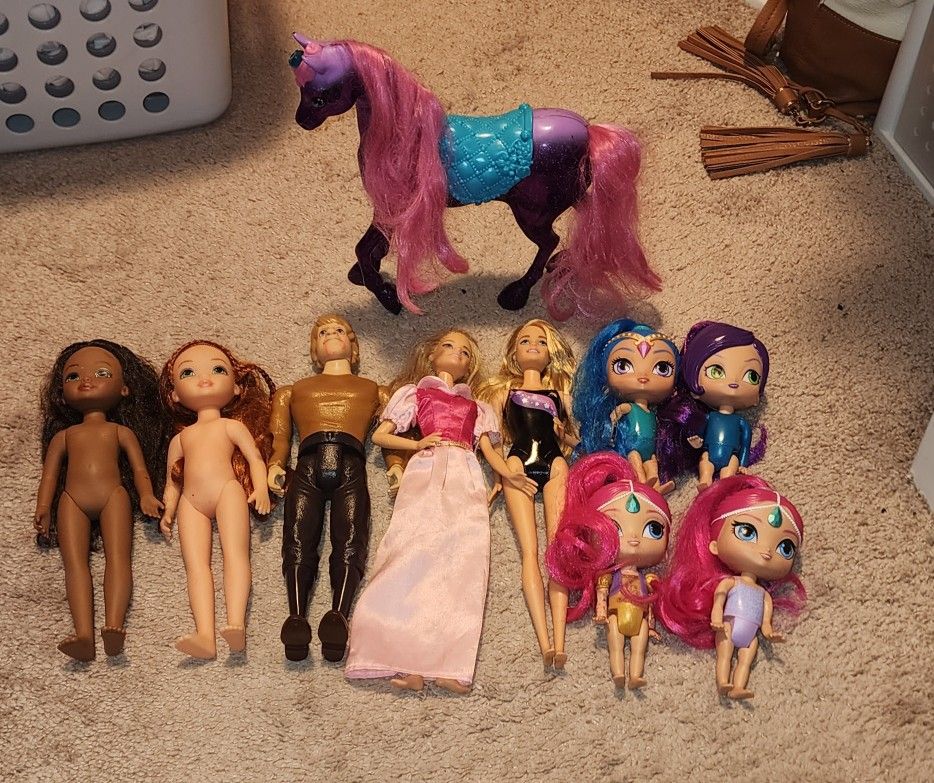 Assorted Dolls and Toy Unicorn