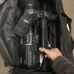JVC video recorder jvc gy-hd110 minidv 720p  external usb, and tripod stand with bag