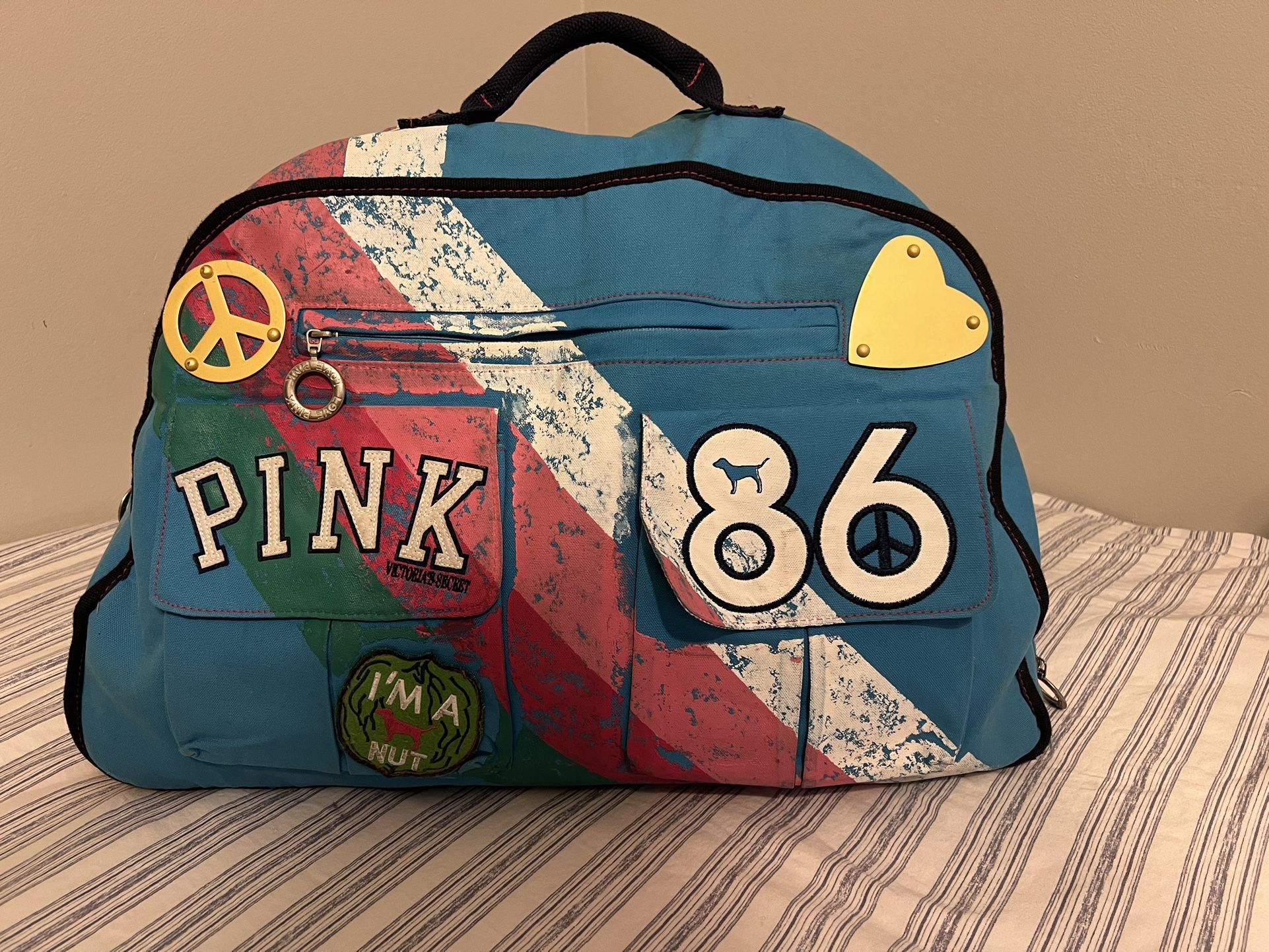 Vintage Victoria Secret Pink Rolling Luggage
