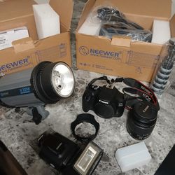 Canon EOS 4000D DSLR W/ Canon EF 18-55mm F/3.5 -5.6 lll Zoom Lens + Case  * Neewer  300W Moonlight (X2) Soft Box (1) 32' Translucent Umbrella 