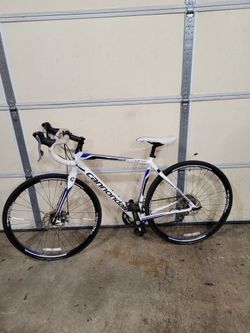 2 road bikes (Bianchi, Cannondale)