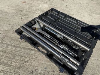 Crain junior power stretcher with case and poles