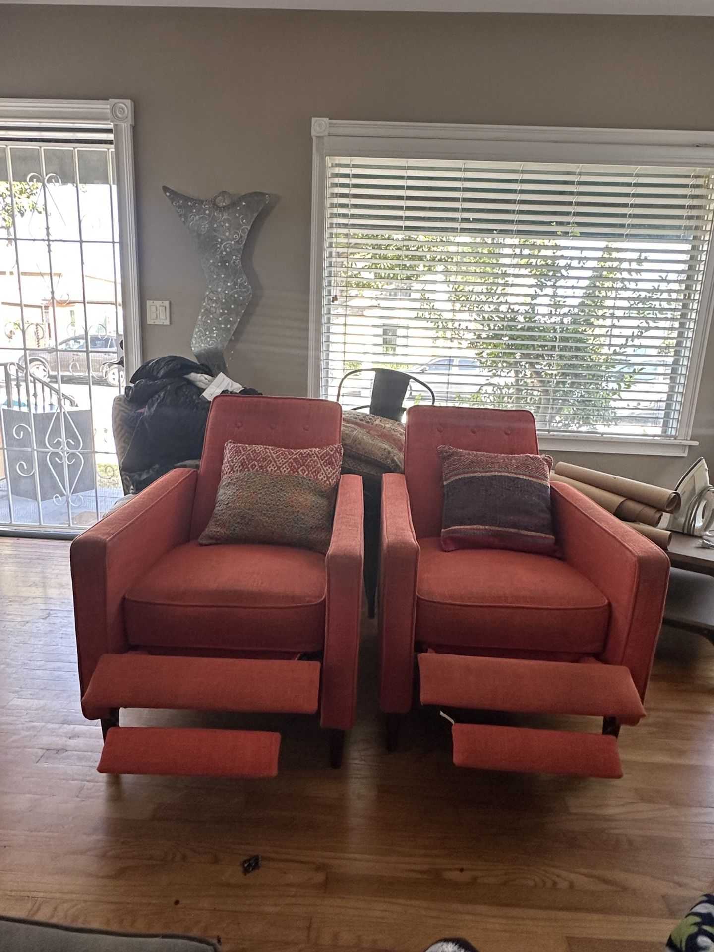 ORANGE RECLINING CHAIRS