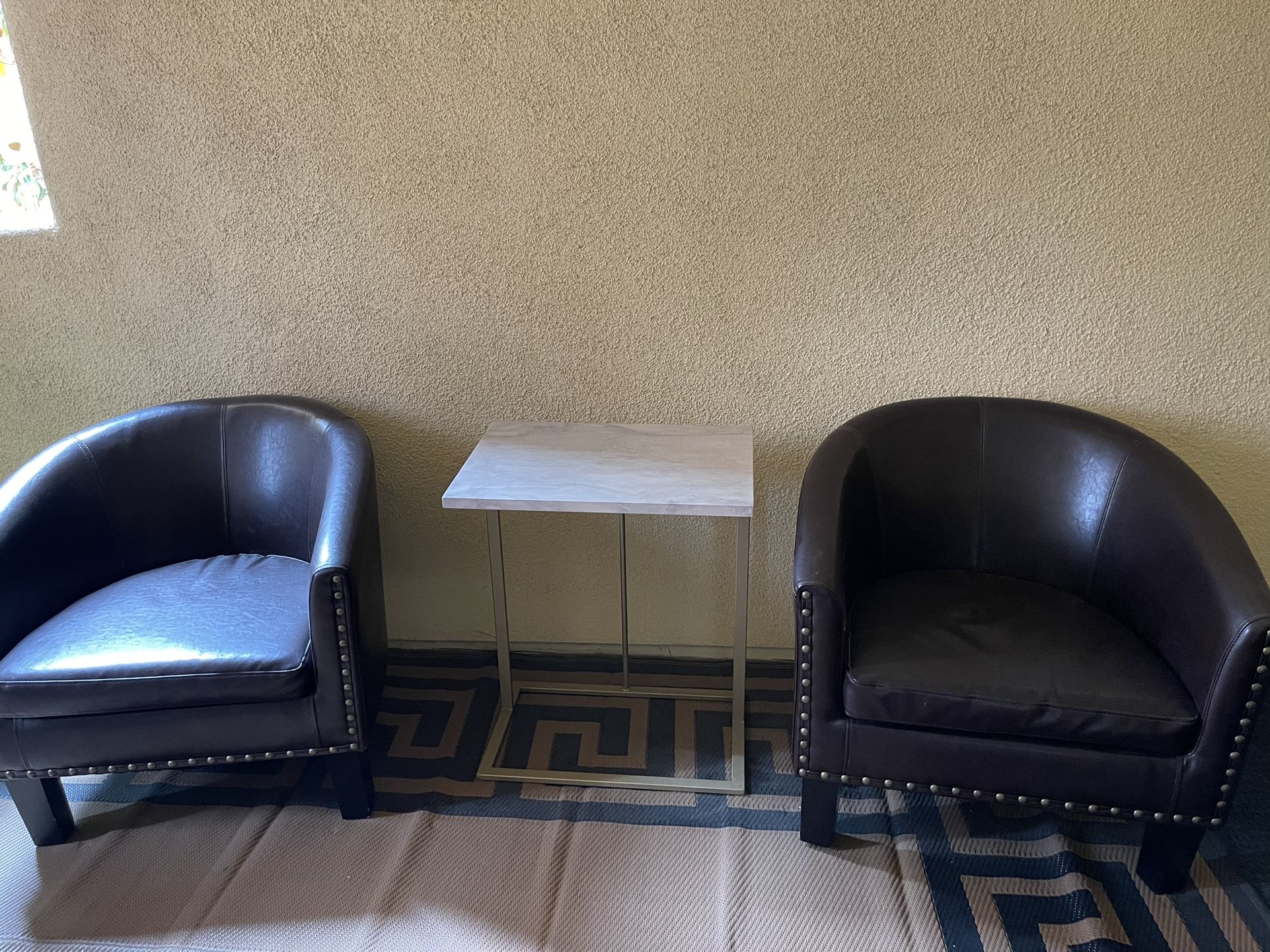 Two Leather Chairs With Center Table