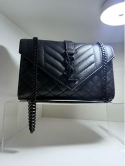 YSL purse black on black worth 3,800