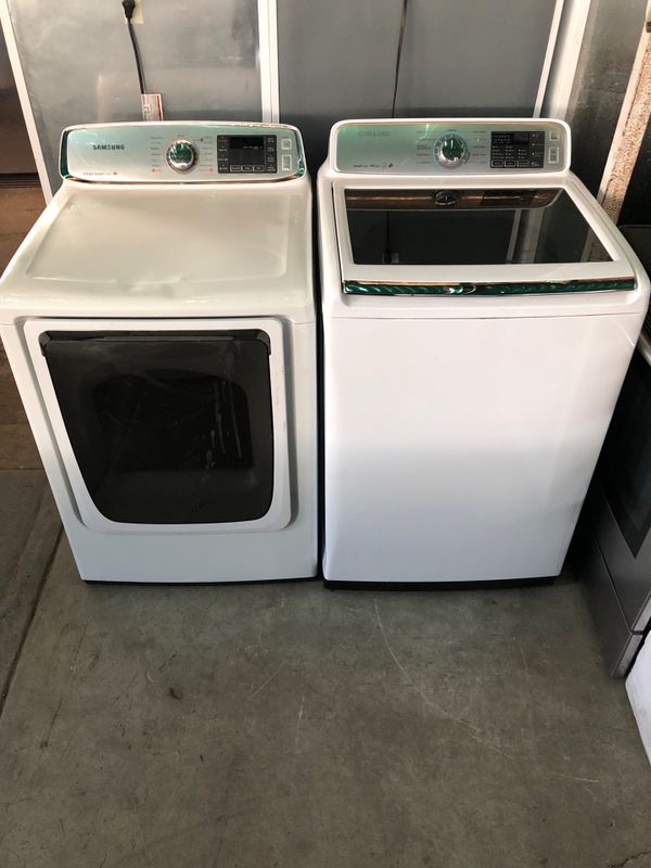 The Samsung top load washer and dryer on clearance for Sale in
