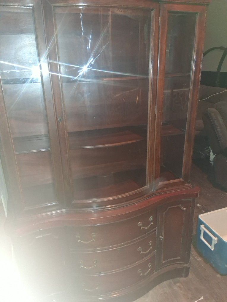 China cabinet.\n 4 foot by 6 approximately\n    One seventy five