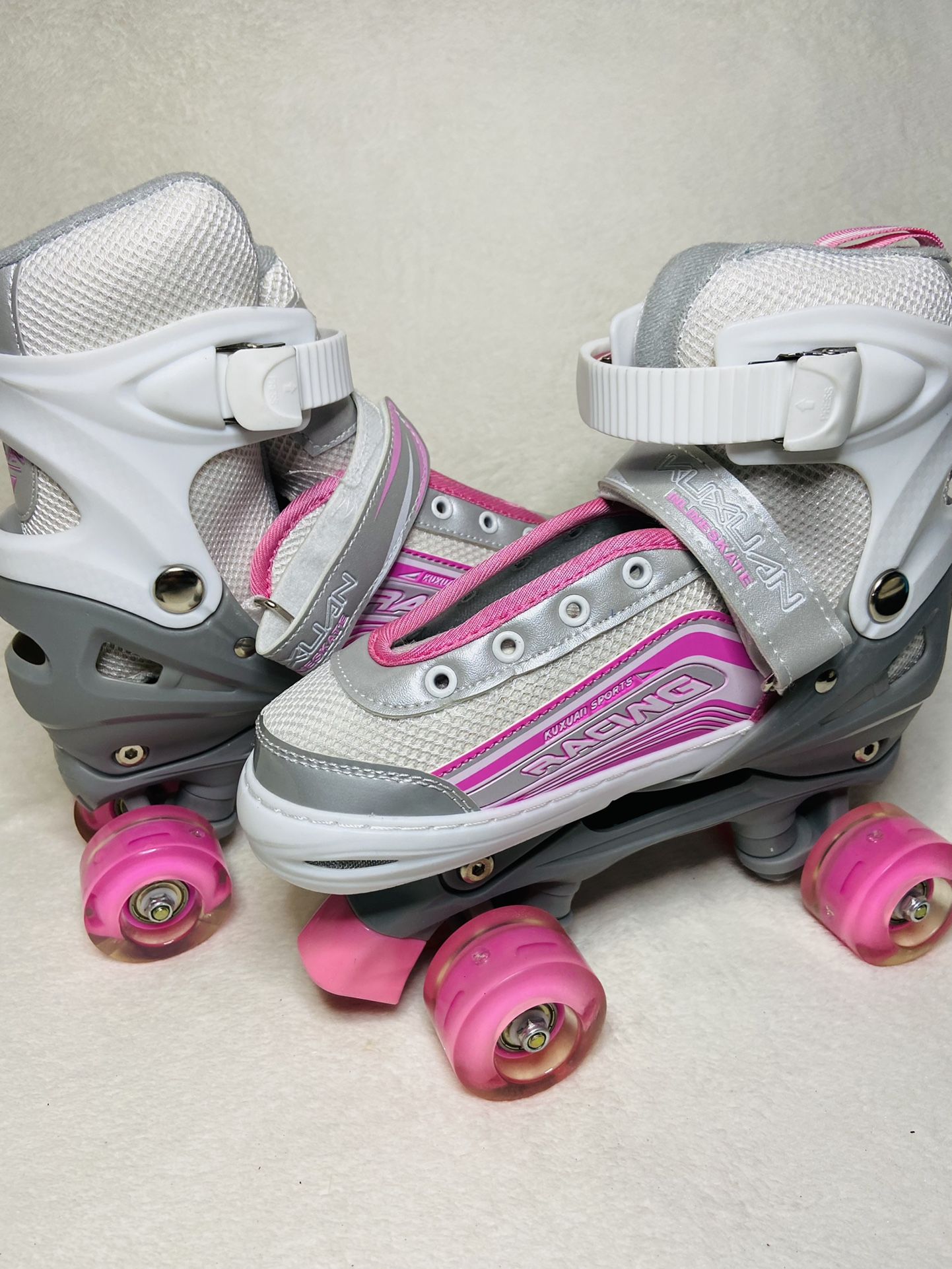 Kuxuan Kids Lightup Roller Skates Adjustable Size Pink Roller Skates